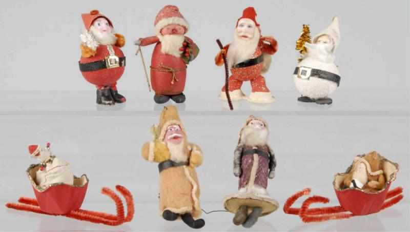 Appraisal: Lot of Santas Description Mostly Japanese Several with cotton bodies