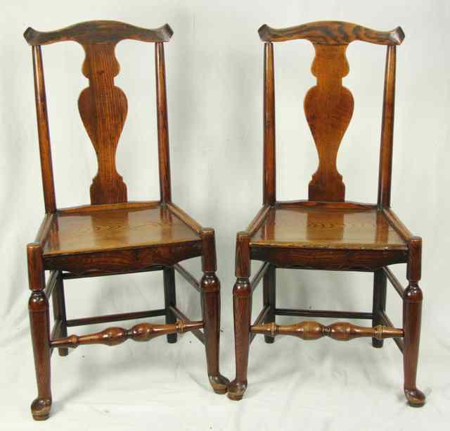 Appraisal: A pair of th Century Welsh style oak chairs with