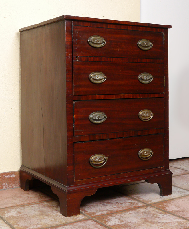 Appraisal: MAHOGANY CAMPAIGN CABINET Mahogany veneer case with single door faux