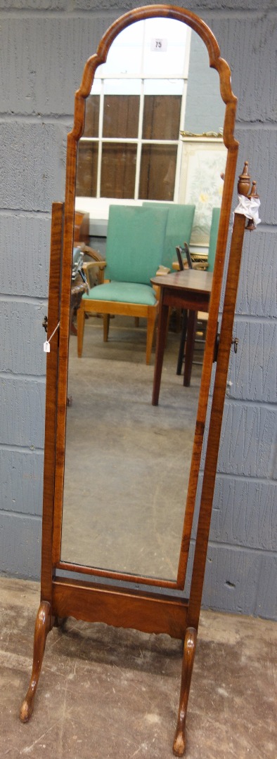 Appraisal: A walnut arched frame cheval mirror in th century style