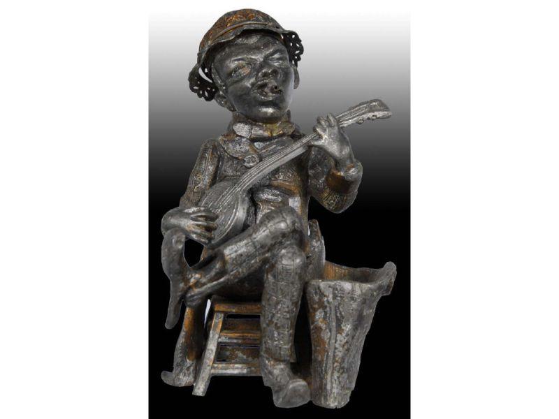 Appraisal: Black Americana Banjo Player Cigar Lighter Description '' T He