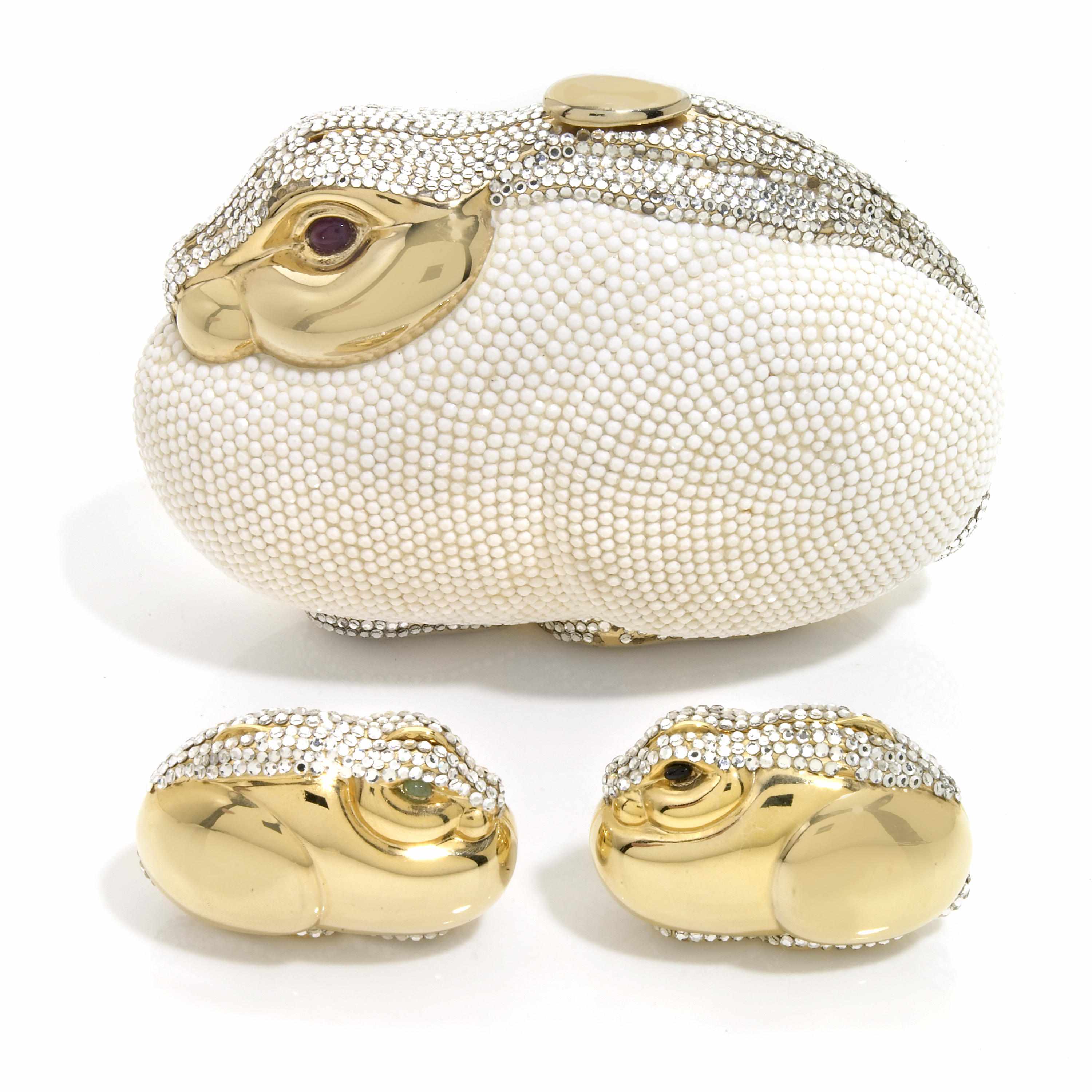 Appraisal: A white bead gold colored metal and silver crystal bunny