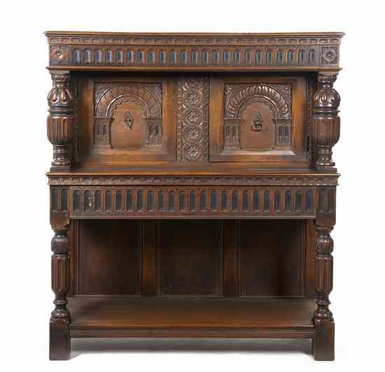 Appraisal: A Renaissance Revival Carved Court Cupboard having a rectangular top