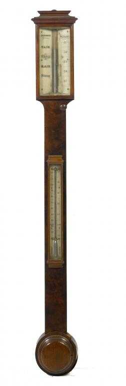 Appraisal: A VICTORIAN WALNUT CISTERN BAROMETER BY JOHN BENJAMIN DANCER the