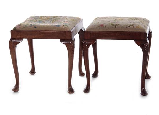 Appraisal: Pair Queen Anne style mahogany footstools circa needlepoint slip seat