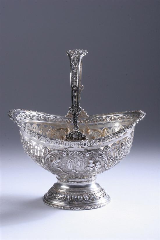 Appraisal: GERMAN SILVER FOOTED BASKET Reticulated body decorated with swags each