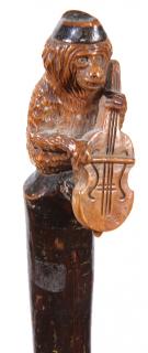 Appraisal: Monkey and Violin Folk-Art Cane Ca A one-piece carved folk-art