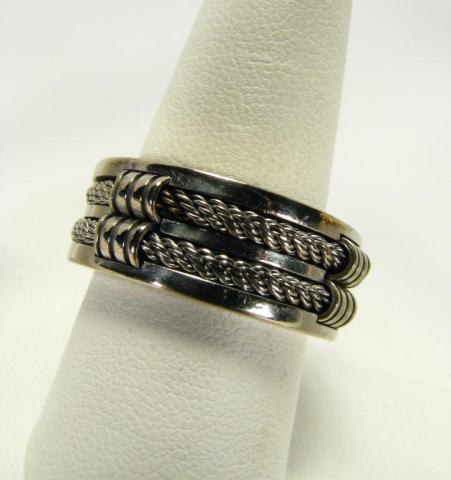 Appraisal: Bold gents ''Dora'' designer k white gold motif band with