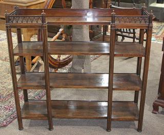 Appraisal: Regency rosewood etagere th century having a pierced gallery in