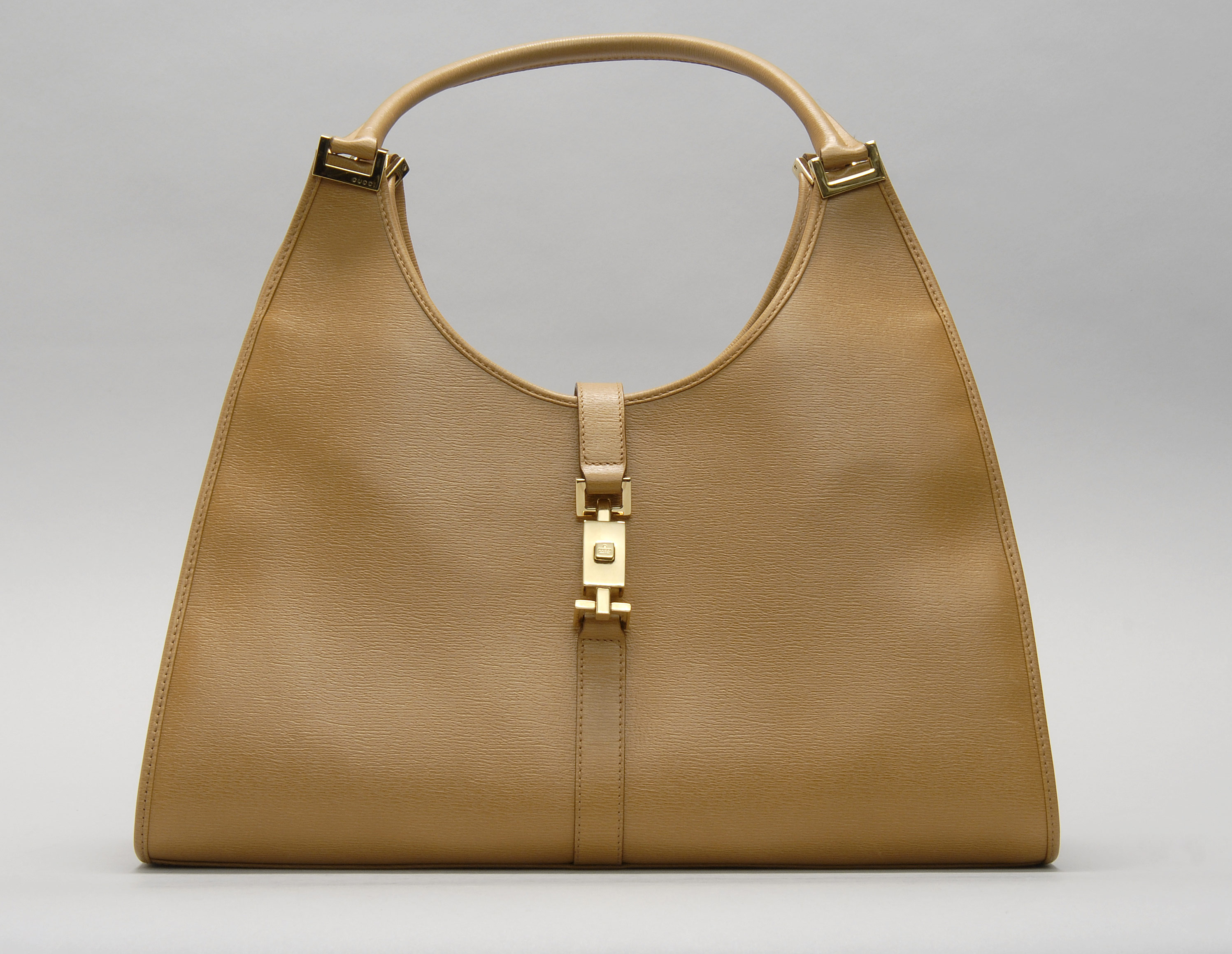 Appraisal: GUCCI ITALIAN TAN LEATHER JACKIE HOBO PURSE Gold hardware marked