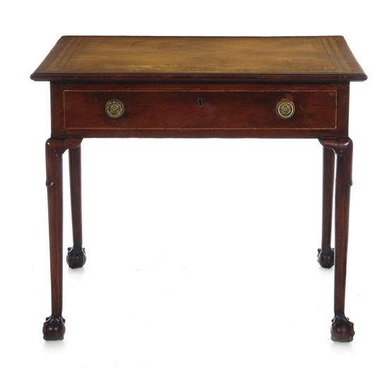 Appraisal: Georgian style mahogany table th century inset leather top skirt