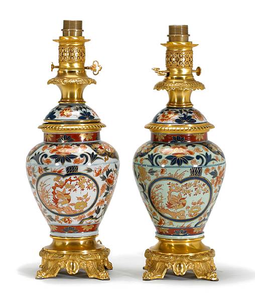 Appraisal: A pair of Japanese Imari porcelain gilt bronze mounted jars