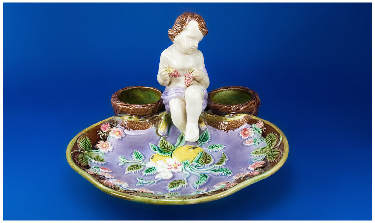 Appraisal: Majolica Strawberry Dish George Jones Style th C Cherub between