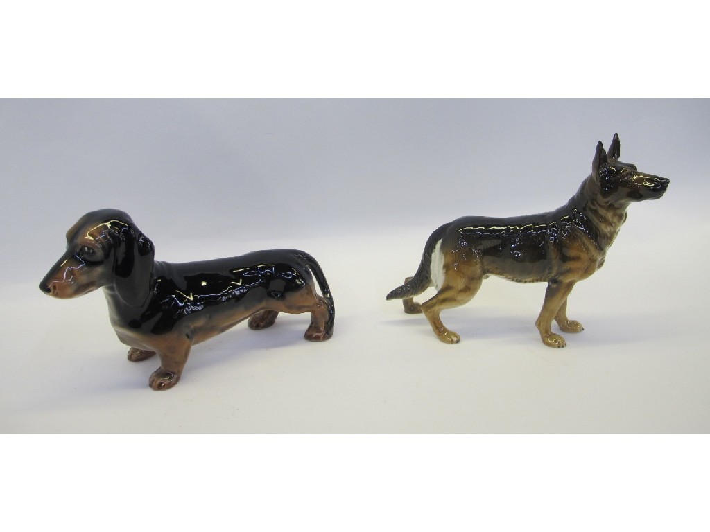 Appraisal: Goebel figure of a German Shepherd and a Beswick Dachshund