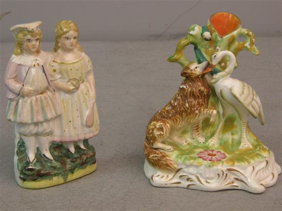 Appraisal: Staffordshire figural group of a boy and a girl high