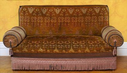 Appraisal: LATE VICTORIAN TURKISH-STYLE SOFA WITH PRINTED PLUSH UPHOLSTERY The rectangular