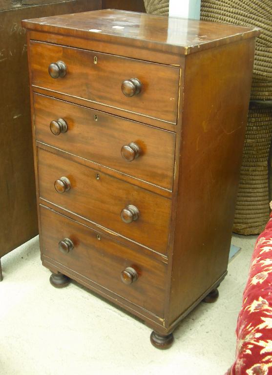 Appraisal: Victorian mahogany four drawer bedroom chest upon short turned feet