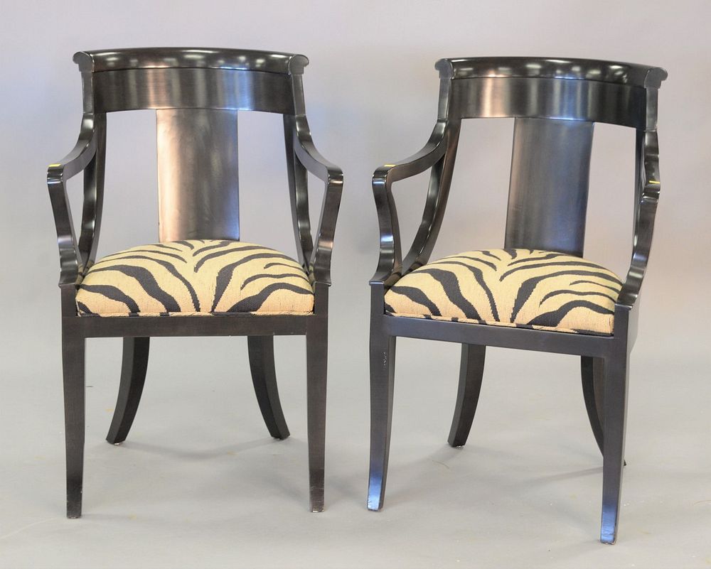 Appraisal: Pair of Baker Empire-style ebonized wood armchairs Estate of Marilyn