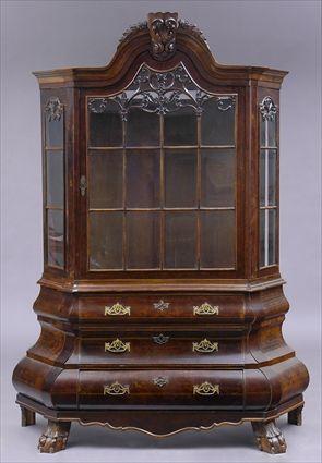 Appraisal: DUTCH WALNUT CABINET The serpentine cresting above a single glazed