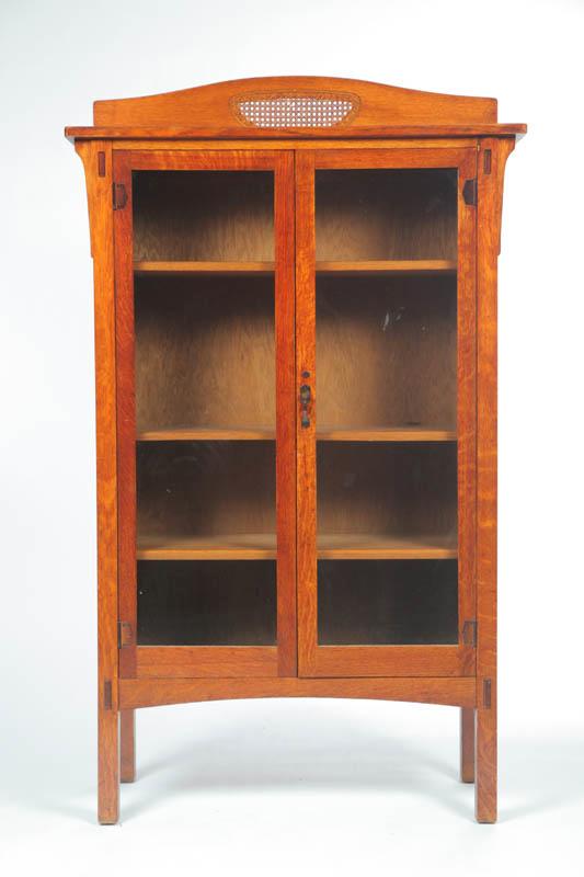 Appraisal: LIMBERT BOOKCASE Oak having a shaped crest with cane panel