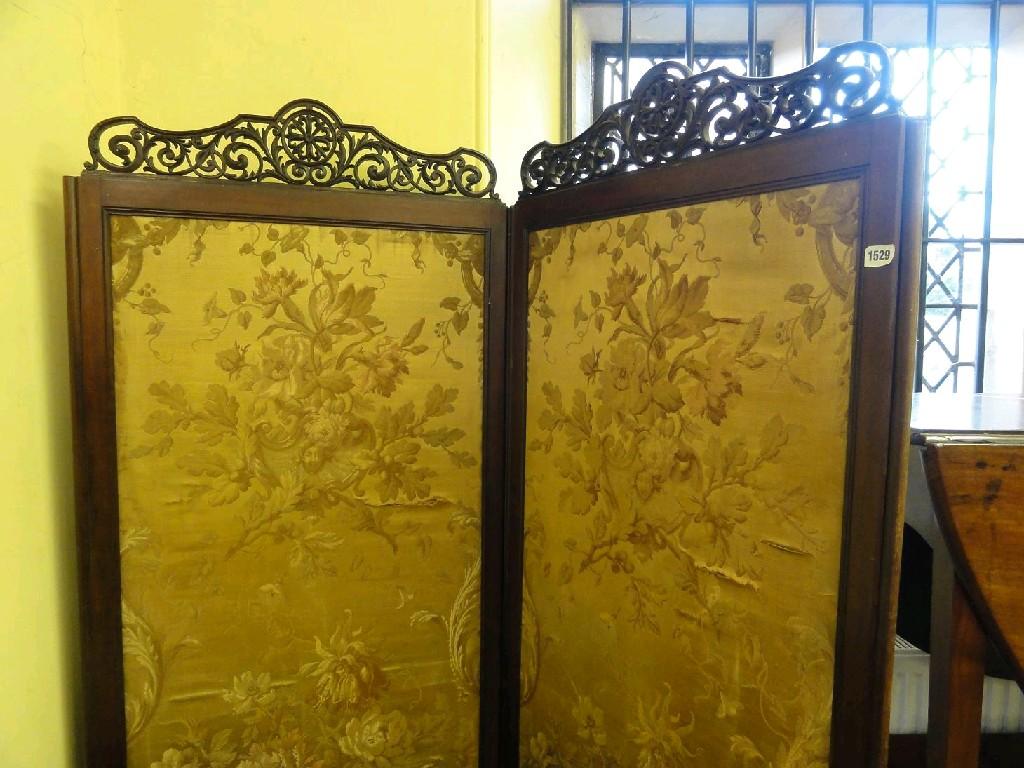 Appraisal: An Edwardian mahogany freestanding two fold screen enclosing three quarter