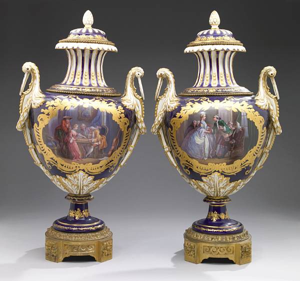 Appraisal: A pair of Sevres style earthenware gilt bronze mounted two