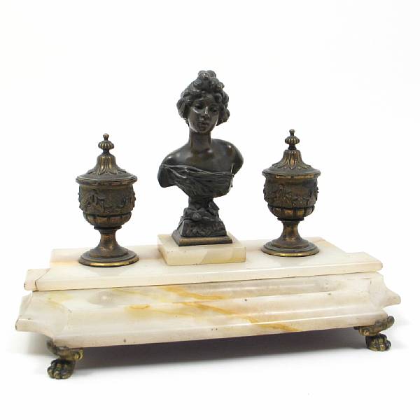 Appraisal: A French patinated bronze and onyx ink stand height in