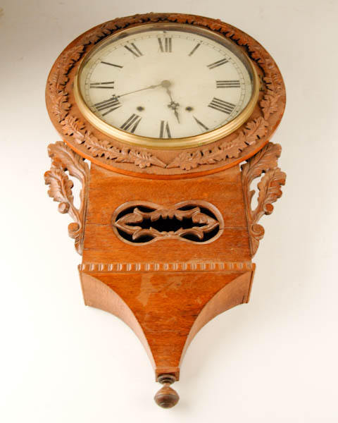 Appraisal: American Carved Oak Wall Clock day time and strike H