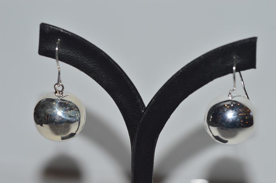 Appraisal: A PAIR OF SILVER BALL EARRINGS TO SHEPHERD HOOK FITTINGS