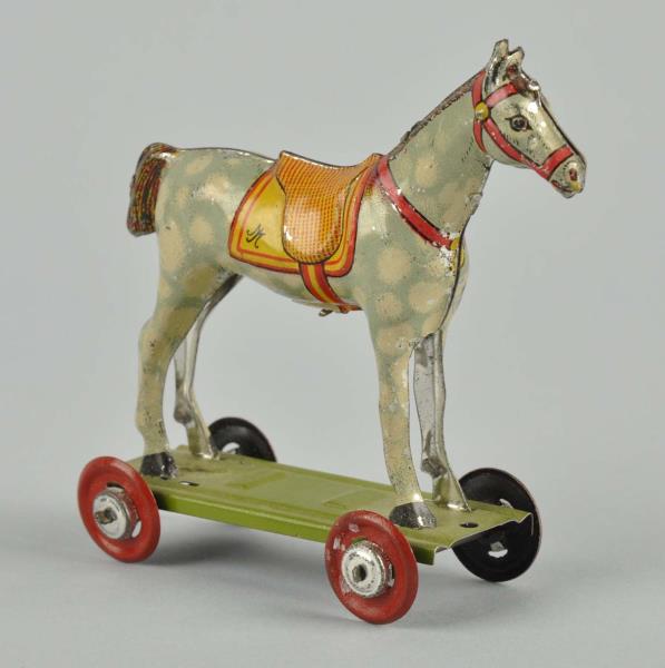 Appraisal: German Tin Litho Platform Horse Penny Toy Marked Gesch on