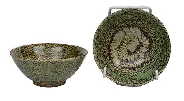 Appraisal: TWO CHINESE GREEN-GLAZED MARBLED CERAMIC BOWLS one of a more