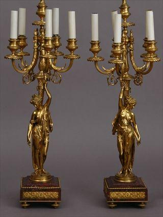 Appraisal: PAIR OF LOUIS XVI-STYLE MARBLE-MOUNTED GILT-BRONZE SIX-LIGHT CANDELABRA MOUNTED AS