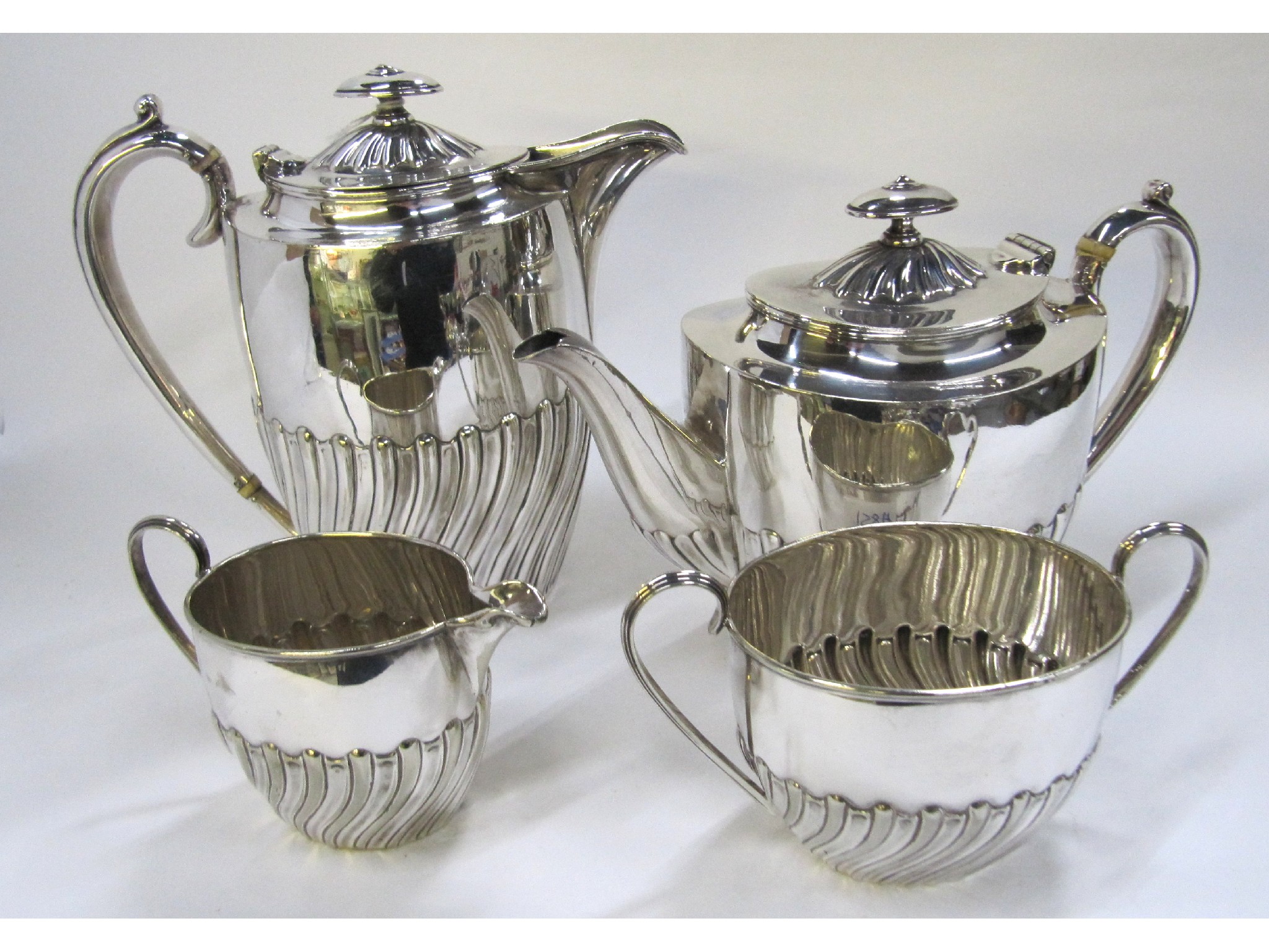 Appraisal: A four piece EPNS tea service