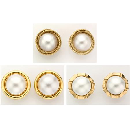 Appraisal: Three Pairs of Gold and Mabe Pearl Earclips Estimate -