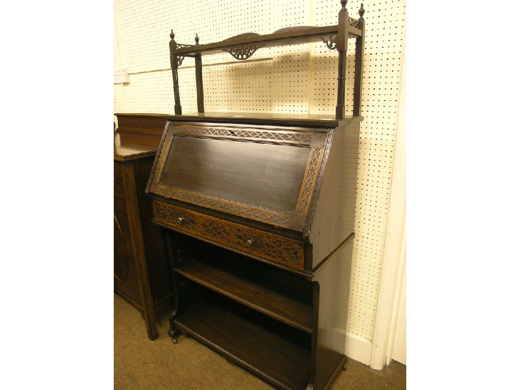 Appraisal: A late Victorian mahogany drawing room bureau over-shelf raised upon