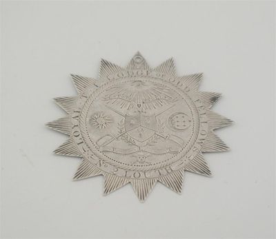 Appraisal: A George III engraved 'Odds Fellows' badge in the form