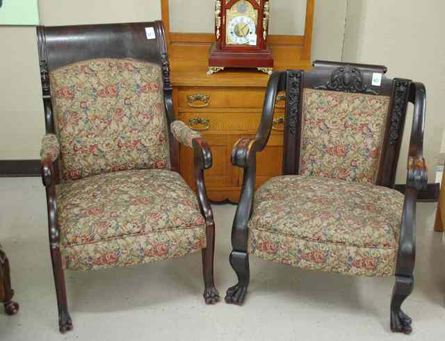 Appraisal: TWO SIMILAR EMPIRE REVIVAL MAHOGANY ARMCHAIRS American c with matching