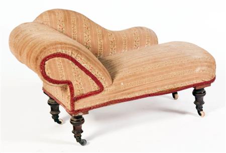 Appraisal: A Victorian miniature chaise longue the scroll back from right