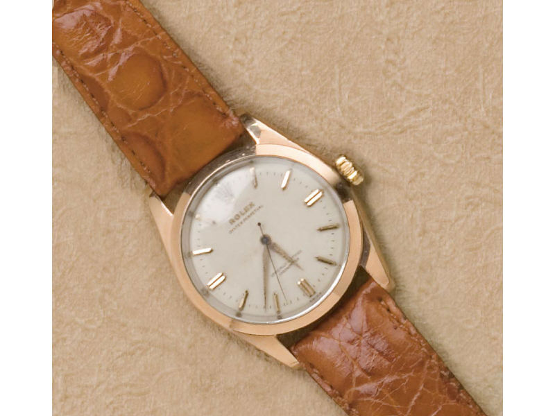 Appraisal: ROLEX OYSTER PERPETUAL Rose gold over steel with leather strap