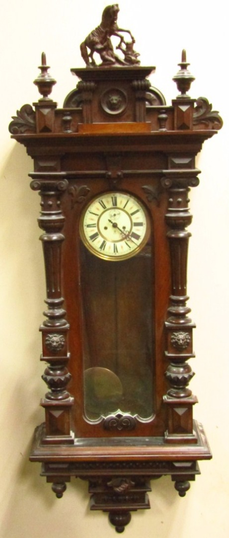 Appraisal: A thC walnut cased Vienna wall clock by Gustav Becker