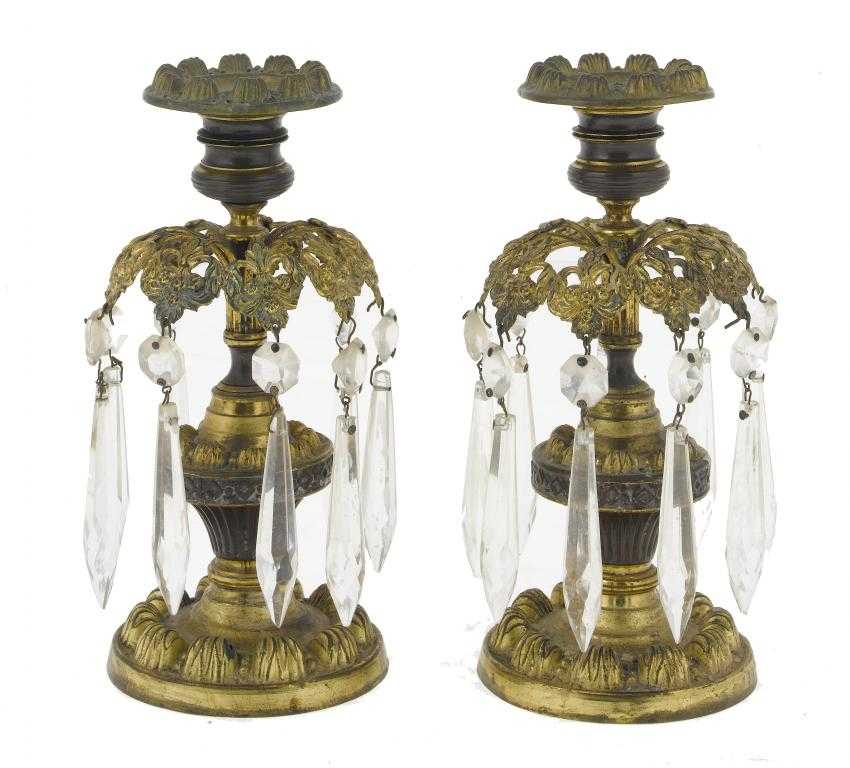 Appraisal: A PAIR OF EMBOSSED GILT AND PATINATED BRASS LUSTRE-CANDL