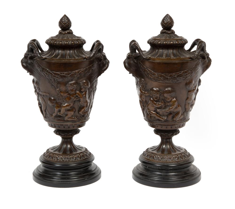 Appraisal: Pair of Empire-Style Patinated Bronze Covered Urns after Clodion grotesque