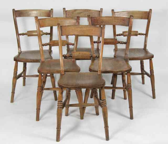 Appraisal: Six pine kitchen chairs with horizontal splats to the backs