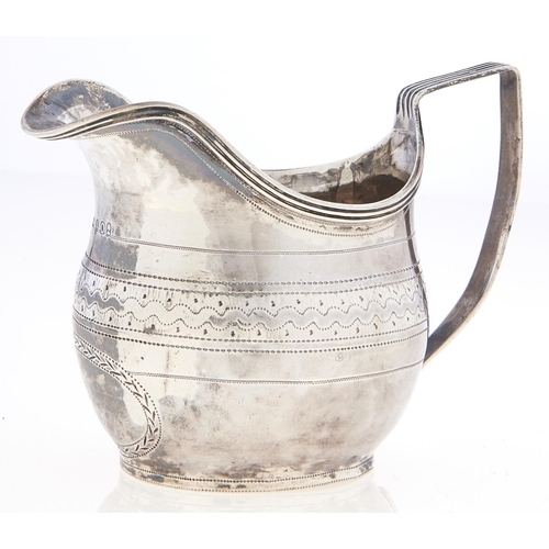 Appraisal: A George III silver cream jug reeded handle and rim