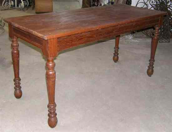 Appraisal: A French Provincial Pitch Pine Farm Table circa having a