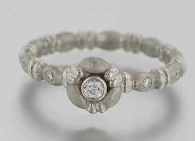 Appraisal: A Delicate Platinum and Diamond Ring Platinum band with matte