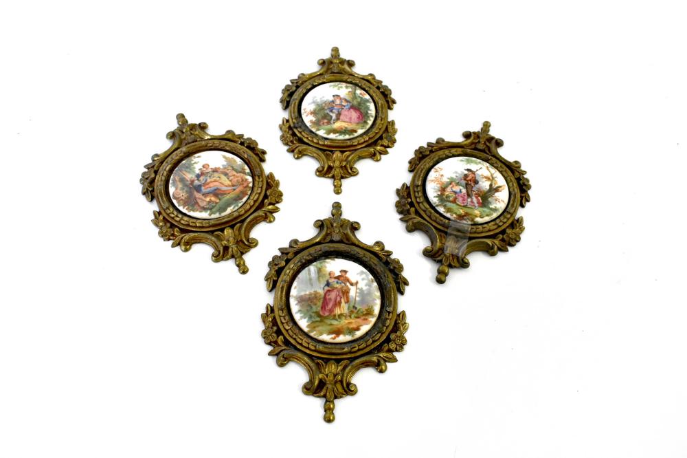 Appraisal: SET OF FOUR PORCELAIN-INSET BRONZE MOUNTSEarly th Century The reverse