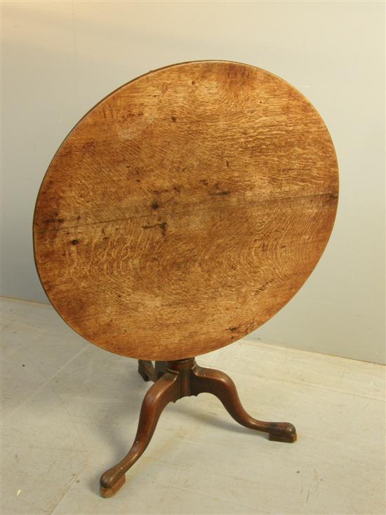 Appraisal: George III oak round table on tripod base h w