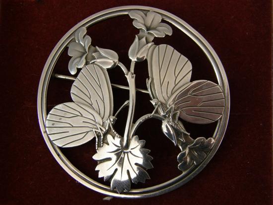 Appraisal: GEORGE JENSEN silver brooch depicting butterflies and flowers