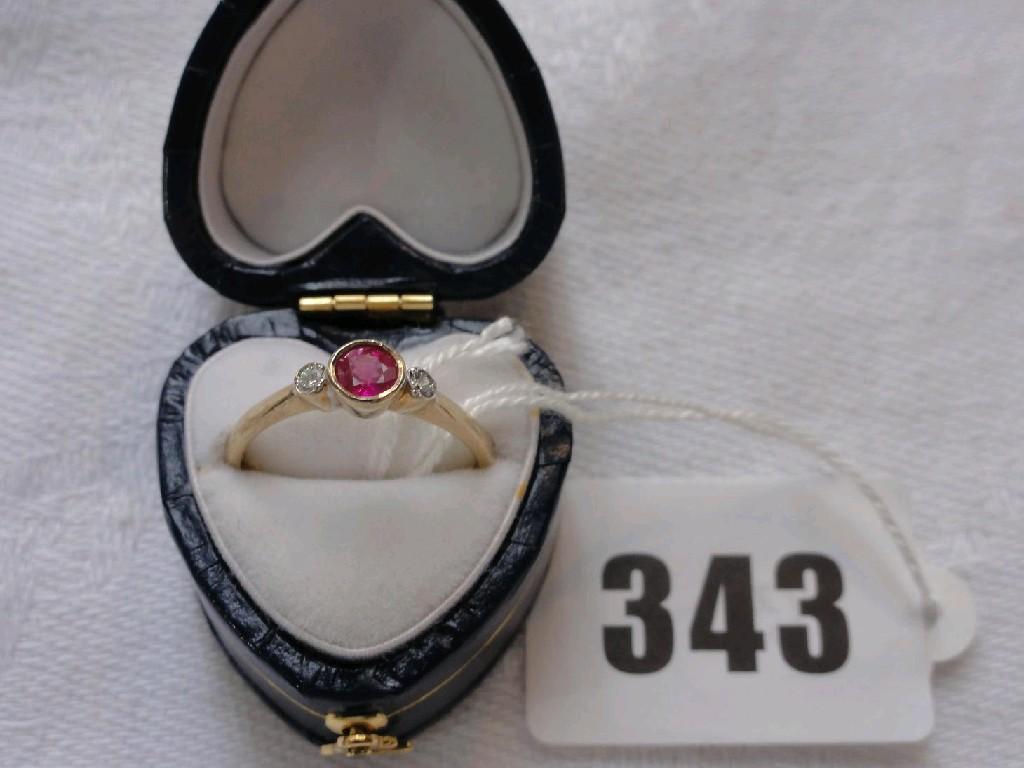 Appraisal: A ct gold ring with central ruby flanked by diamonds